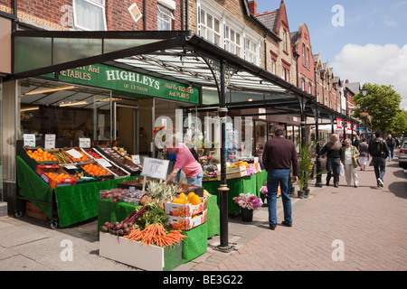 Lytham St Annes, Lancashire, England, UK. Small shops with green grocers selling fruit and vegetable on display outside Stock Photo