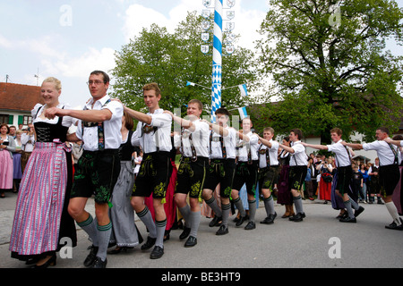 Dance around the maypole in Eurasburg, community Eurasburg, district of Bad Toelz Wolfratshausen, Bavaria Stock Photo