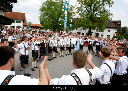 Dance around the maypole in Eurasburg, community Eurasburg, district of Bad Toelz Wolfratshausen, Bavaria Stock Photo
