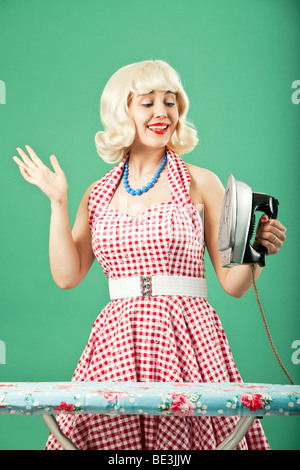 Retro Housewife with her new iron Stock Photo