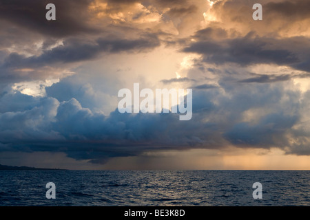 Storm, rain shower and thunderstorm over the sea Stock Photo