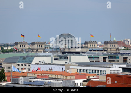 Dome of the Reichstag parliament over the rooftops of Berlin, Germany, Europe Stock Photo