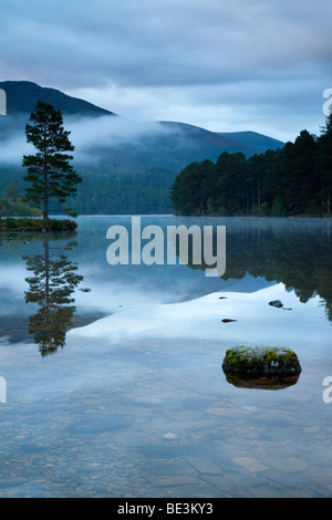 Loch an Eilein in the Scottish Cairngorm Mountains part of the Rothiemurchus Estate and Rothiemurchus Forest, Aviemore Stock Photo