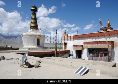 Shey monastery with a satellite antenna and a bike wheel as a radio antenna and solar cell, Ladakh, India, Himalayas, Asia Stock Photo