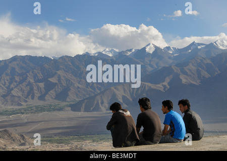 Ladakhi people looking over the oasis Leh and the Indus valley and on the Zanskar mountain range, Ladakh, India, Himalayas, Asia Stock Photo