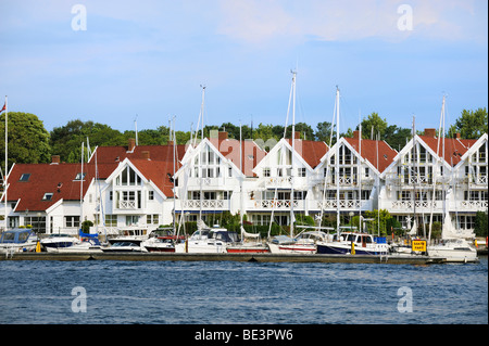 White wooden houses at the marina in Stavanger, Norway, Scandinavia, Northern Europe Stock Photo