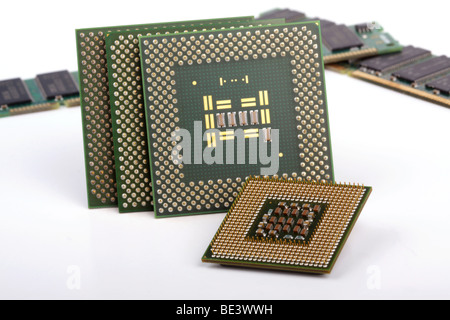 Several computer chips on a white background. Stock Photo
