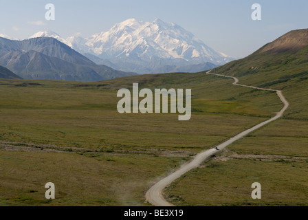 Backcountry road, Denali, Alaska with one car leaving a dust trail Stock Photo