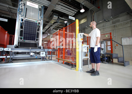 Solon SE: production of solar panels. Worker during the final quality control, BERLIN, GERMANY