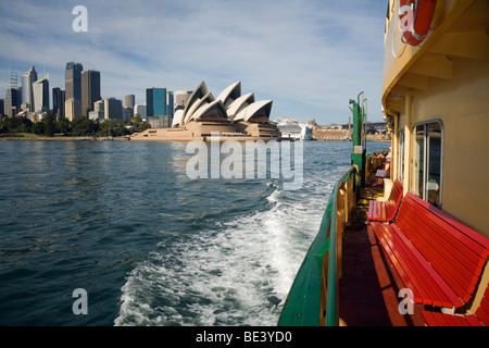 View of the Opera House and city skyline from the deck of a Sydney ferry. Sydney, New South Wales, AUSTRALIA Stock Photo