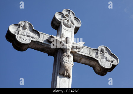 ornate stone cross against a blue sky at the franciscan monastery arenes cimiez nice south of france Stock Photo