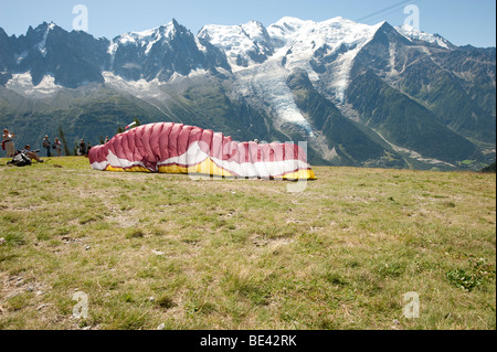 Paraglider pilots on the Brevent, in the Chamonix Valley, France. Stock Photo