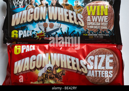 Wagon Wheels biscuits biscuit - 6 pack packets of original plain and jammie flavour Wagon Wheels biscuits Stock Photo