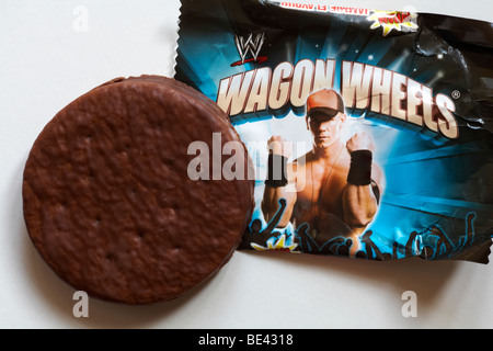 Wagon Wheels biscuit - individual packet of jammie flavour Wagon Wheels biscuits set on white background Stock Photo