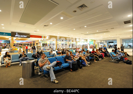 Stores and passengers at an airport gate, waiting area, Brisbane International Airport, Brisbane, Queensland, Australia Stock Photo