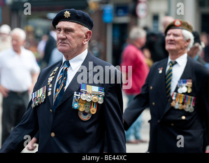 Veterans take part in a parade across Tower Bridge, to mark the first Armed Forces Day, London 26 June 2009 Stock Photo