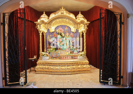 Gold Hare Krishna altar with Lord Krishna Stock Photo