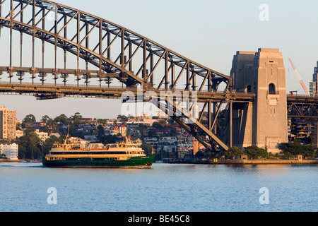 The Manly ferry and Sydney Harbour Bridge at dawn. Sydney, New South Wales, AUSTRALIA Stock Photo