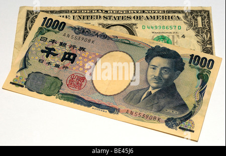 Japanese Yen and US Dollar Bank Notes. Stock Photo