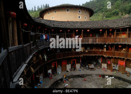 Round courtyard of a Tulou round house, dirt round houses, adobe round houses, the Chinese minority Hakka, near Yongding and Hu Stock Photo