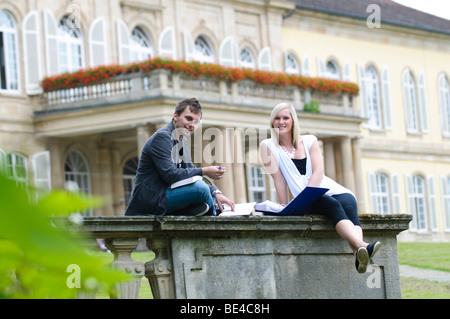 Students at the University of Hohenheim, in front of Hohenheim Castle, Hohenheim, Baden-Wuerttemberg, Germany, Europe Stock Photo