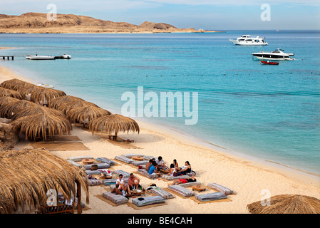 People at beach on pillow seats, beach, parasols, lagoon, swimmers, people, ships, Beach Mahmya, beach, Giftun Island, Hurghada