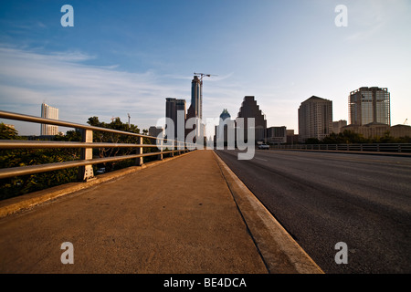 Austin, Texas Skyline with State Capitol building in the distance. Shot from the top of the Ann Richards Congress Ave. Bridge. Stock Photo