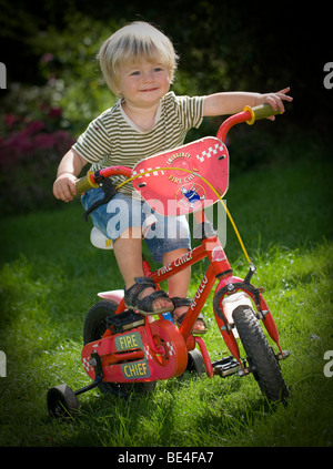 Little boy on his bicycle Stock Photo