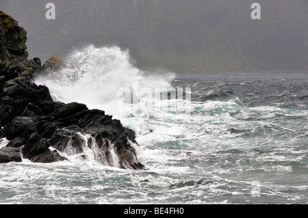 Waves crashing on rocks Stock Photo