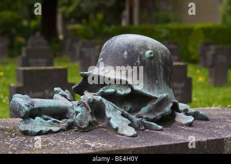 Steel helmet, sword and oakleaves, war memorial and war cemetery from the First World War in Bad Godesberg, Bonn, North Rhine-W Stock Photo