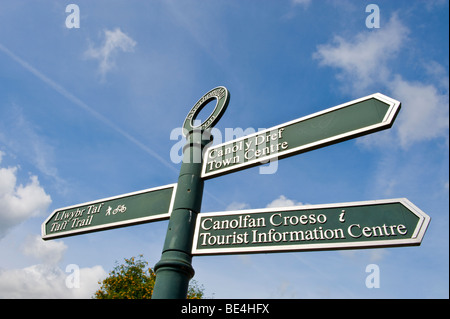 Bilingual Welsh English language tourism direction signs in Brecon Powys Wales UK Stock Photo