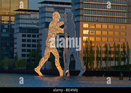 Molecule Man sculpture in the Spree River in front of Treptowers, Berlin, Germany, Europe Stock Photo