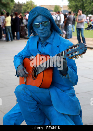 Blue Man With Guitar Busking South Bank London UK Europe Stock Photo ...