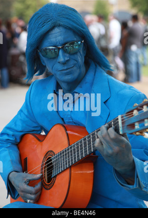 Blue Man With Guitar Busking South Bank London UK Europe Stock Photo ...