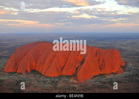 Aerial view of Uluru, Ayers Rock at sunset, Uluru-Kata Tjuta National Park, Northern Territory, Australia Stock Photo