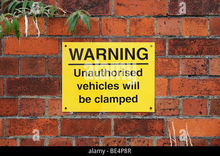 Vehicle Clamping Warning Sign. Oxford, United Kingdom. Stock Photo