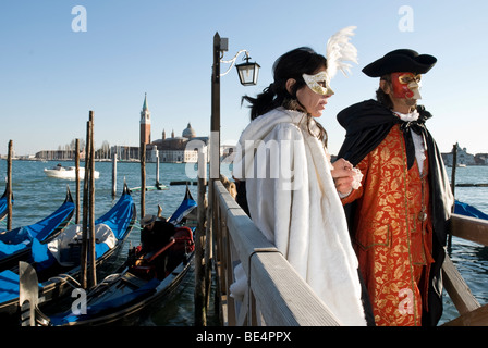 Couple wearing costumes in Piazza San Marco during the Venice Carnival 2009. Stock Photo