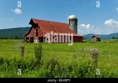 Red Barn and Fence in Grassy Cove in Cumberland County, Tennessee Stock Photo