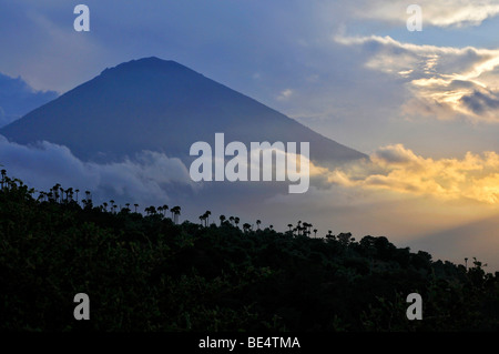 Sunset with the volcano Gunung Agung in Amed, Bali, Indonesia, Southeast Asia Stock Photo