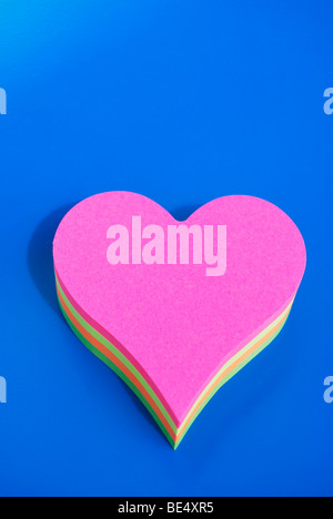 Notepad, heart-shaped, different coloured pieces of paper Stock Photo