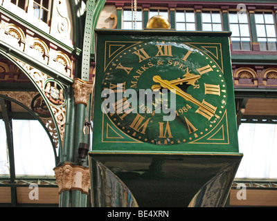 M&S clock and Interior of City Markets Leeds West Yorkshire UK Stock Photo
