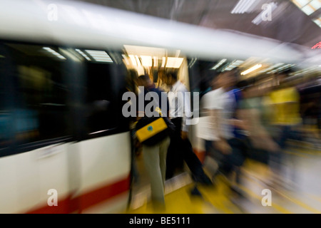 Blur fast movement motion. People in the crowded metro subway train in Kuala Lumpur, Malaysia. South East Asia Stock Photo
