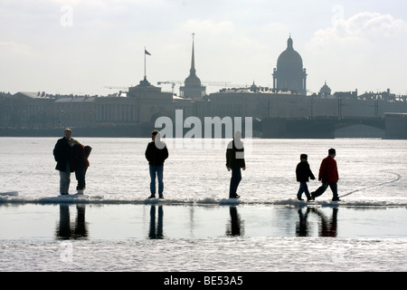 People walking over the frozen Neva River, St. Petersburg, Russia Stock Photo