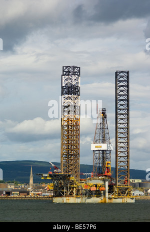 A jackup oil drilling rig, the Ensco 80, in the Cromarty Firth, by the town of Invergordon. Stock Photo