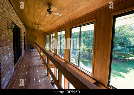 Interior view of the atrium (solarium) in a passive solar 'envelope house' design home in residential neighborhood. Stock Photo