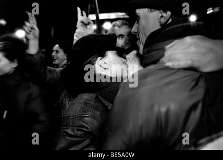 The Velvet Revolution.Two women kiss while celebrating the collapse of Communism in Czechoslovakia. Wenceslas Square, Prague. Stock Photo
