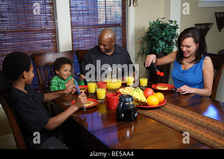Family having breakfast together Stock Photo