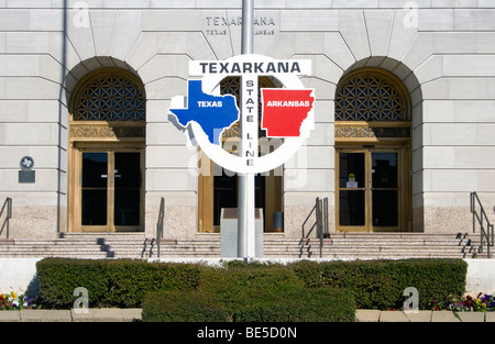 The Texas and Arkansas state line runs through the middle of the Post Office and Court House in downtown Texarkana. Stock Photo