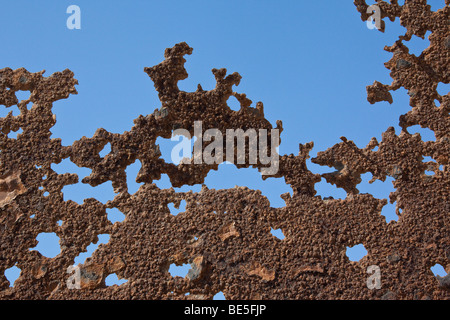 Metal corrosion (Wreckage of an oil drilling platform on the Skeleton Coast in Namibia) Stock Photo