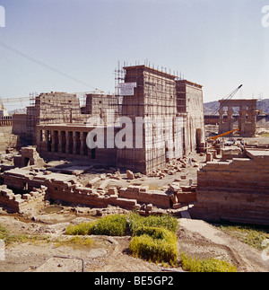 The deconstruction of the drowned Nile temple of Philae, being dismantled stone by stone and relocated to nearby Agilkai Island, Nile Valley, Egypt Stock Photo